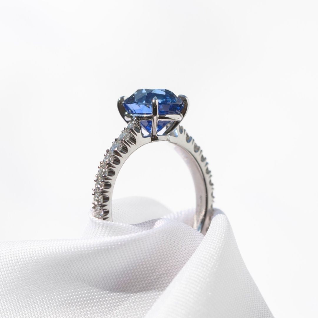 Oval Blue Sapphire Gemstone with U Pave Tapered Cathedral Platinum Engagement Ring