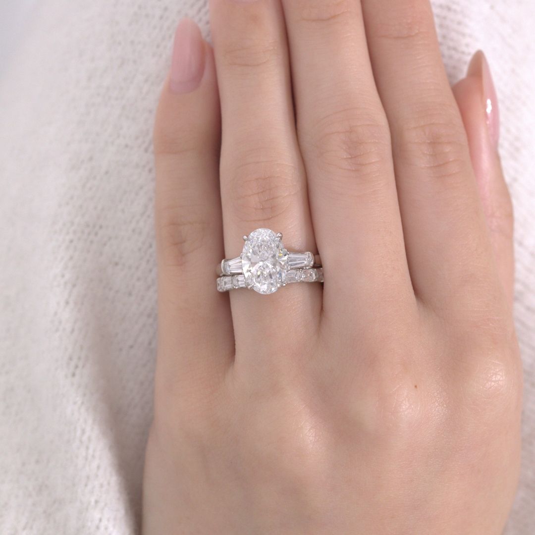 Oval Diamond 3 Stone Ring with Tapered Baguette Side Stones Platinum Engagement Ring