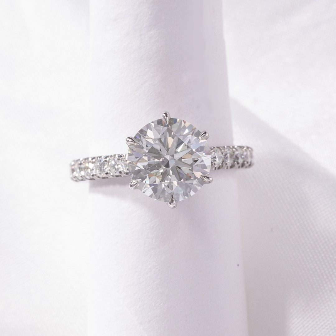 Round Diamond Tulip Basket 6 Prong Tapered Cathedral Pave Diamond Bridge U Pave Platinum Engagement Ring
