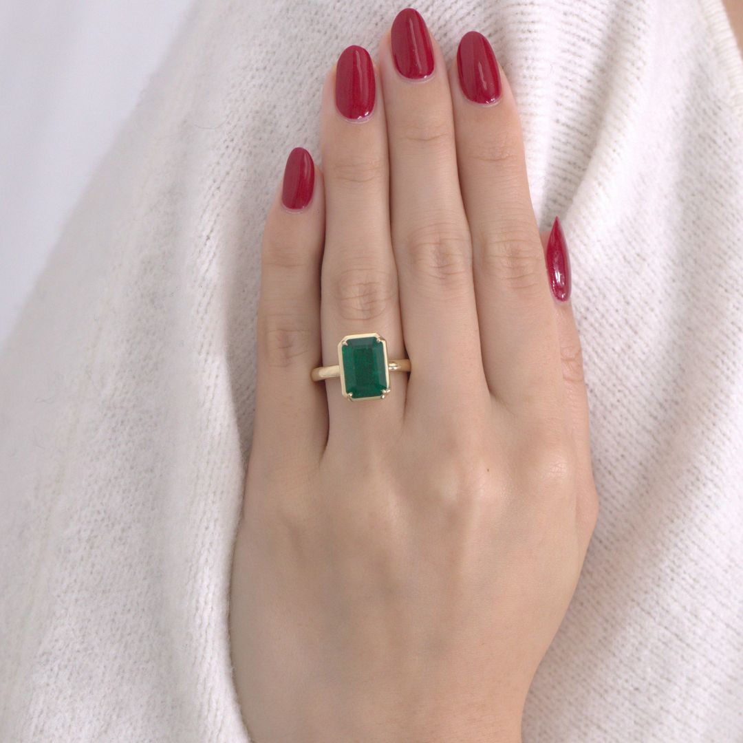 4ct Emerald Cut Green Emerald Mira Bezel Set Yellow Gold Engagement Ring