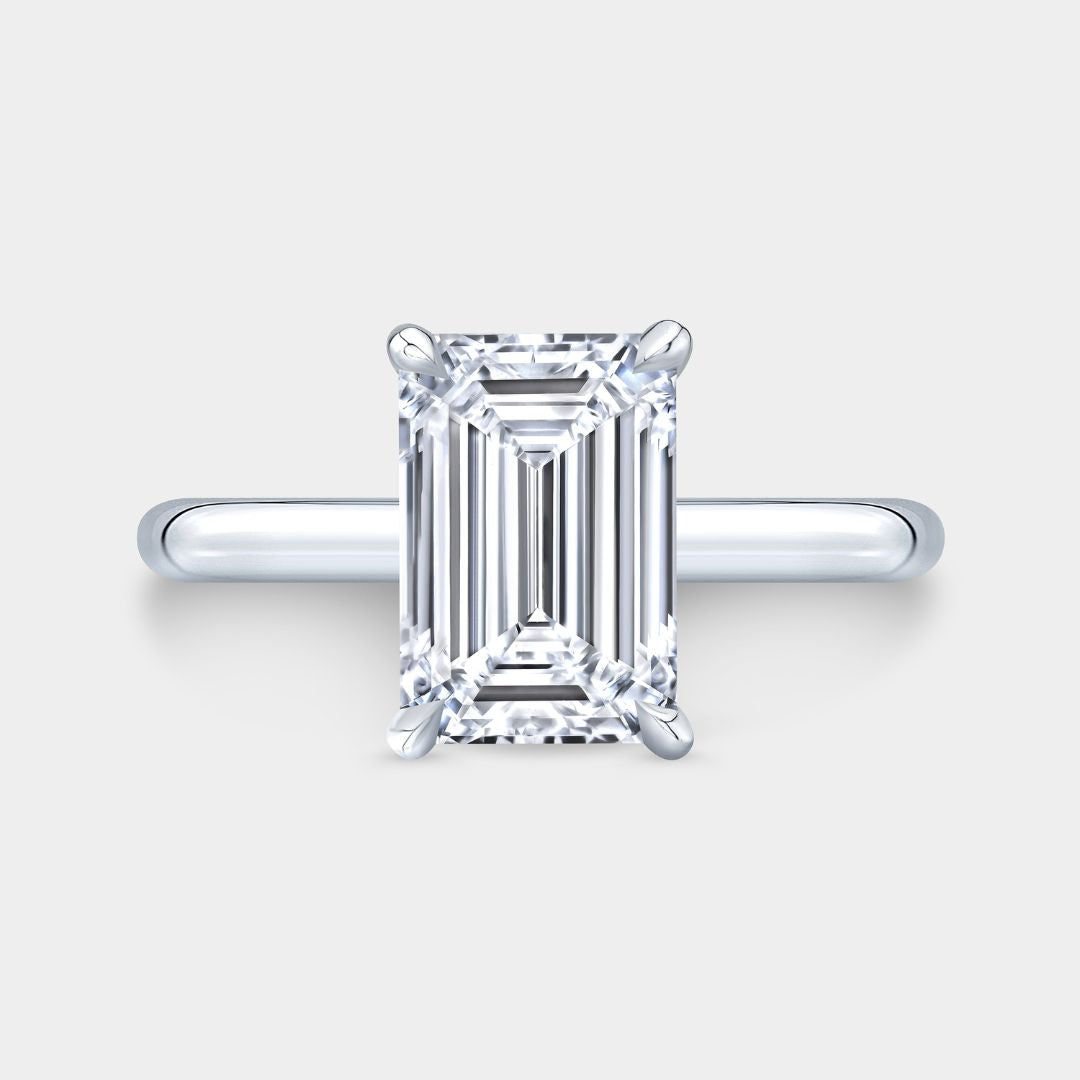 Emerald Diamond Solitaire Platinum Engagement Ring