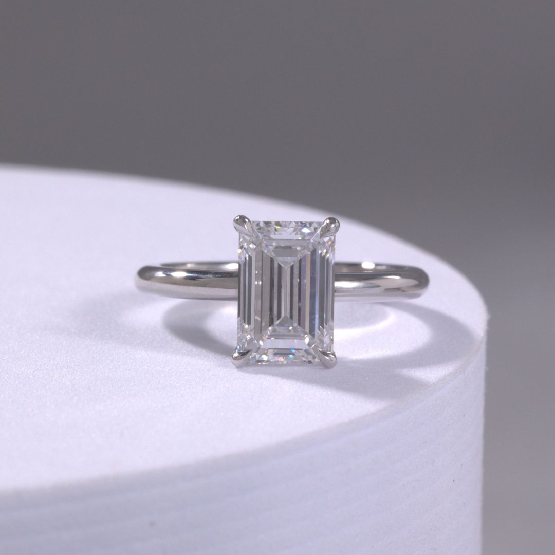 Emerald Diamond Solitaire Platinum Engagement Ring