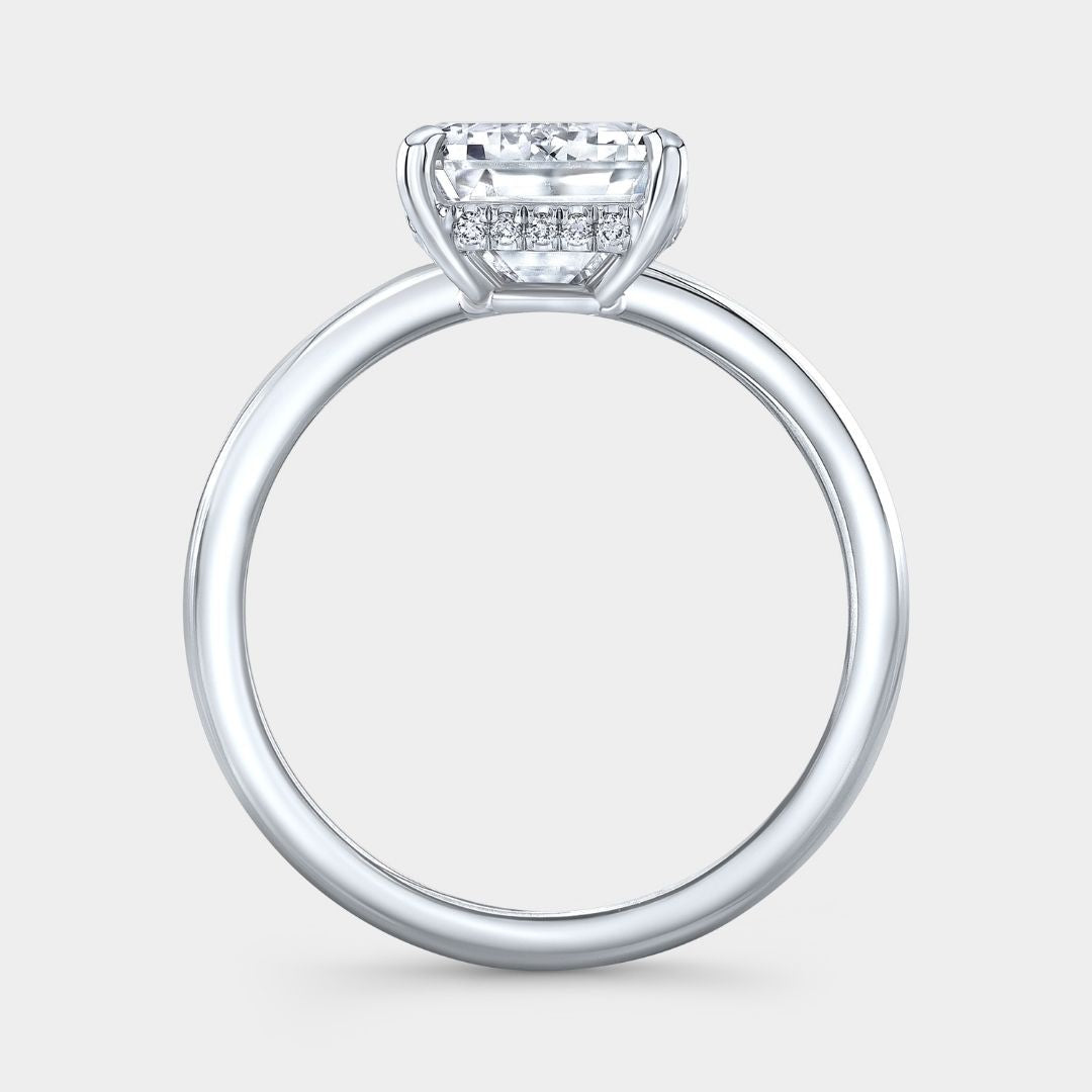 By Bonnie platinum solitaire engagement ring featuring 4.06ct emerald cut diamond