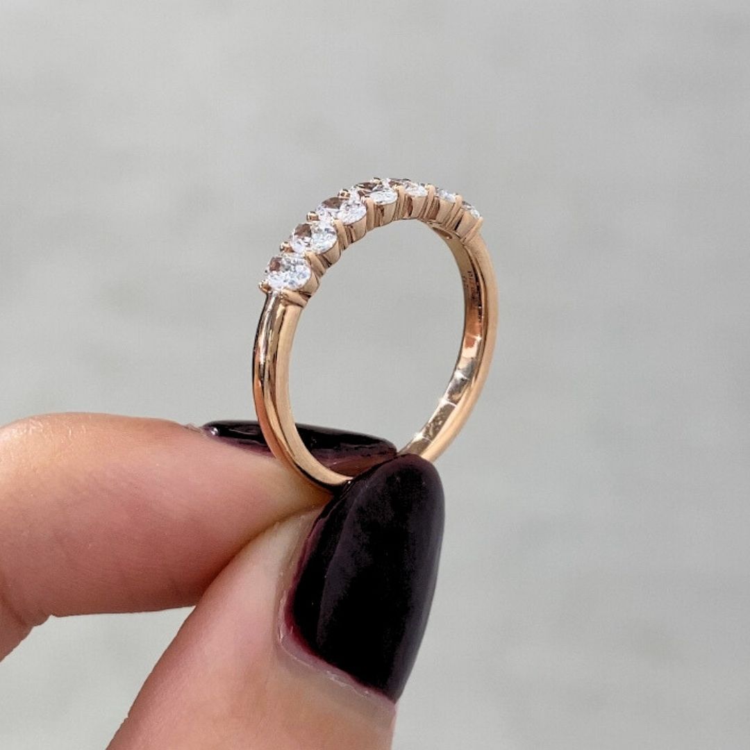 By Bonnie rose gold wedding band featuring seven oval cut natural diamonds