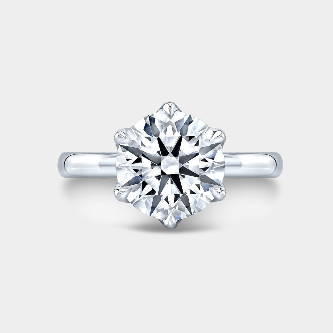 Round Diamond Tulip Solitaire with Peekaboo Platinum Engagement Ring