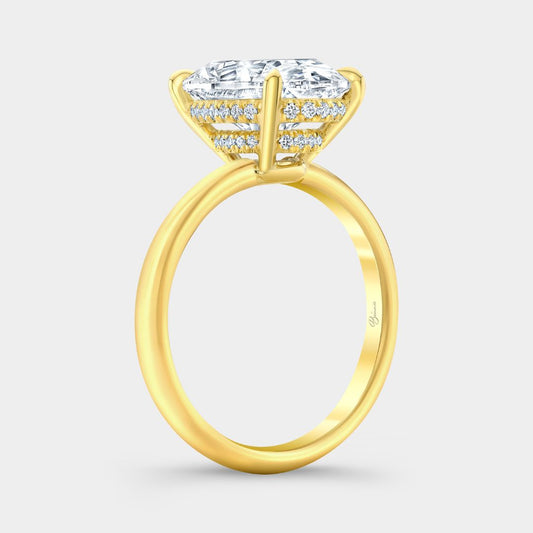 Oval-cut diamond solitaire ring with double hidden halo in yellow gold