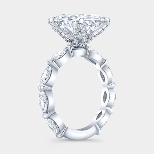 Oval diamond tulip ring, platinum band.