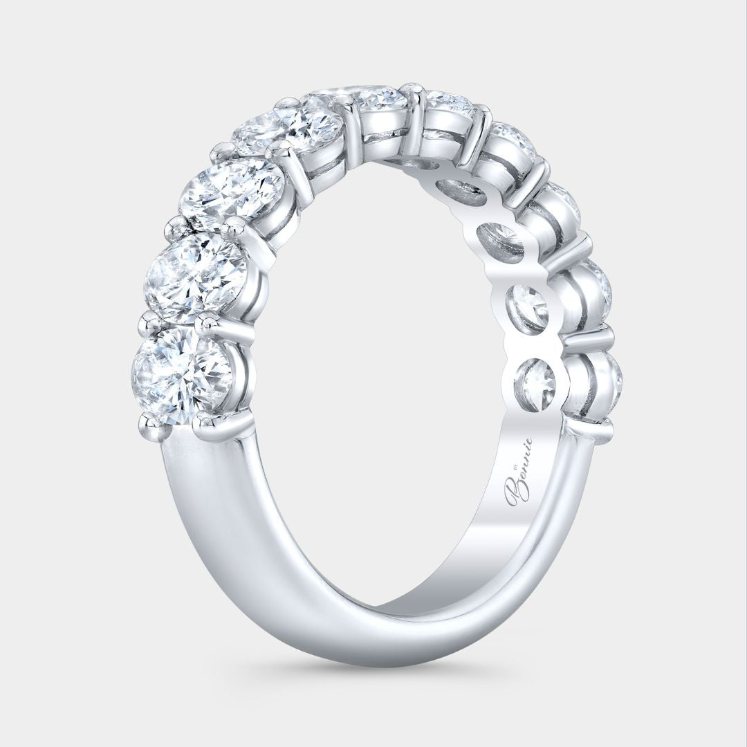 Platinum anniversary half band with 2ct oval diamonds and double gallery design