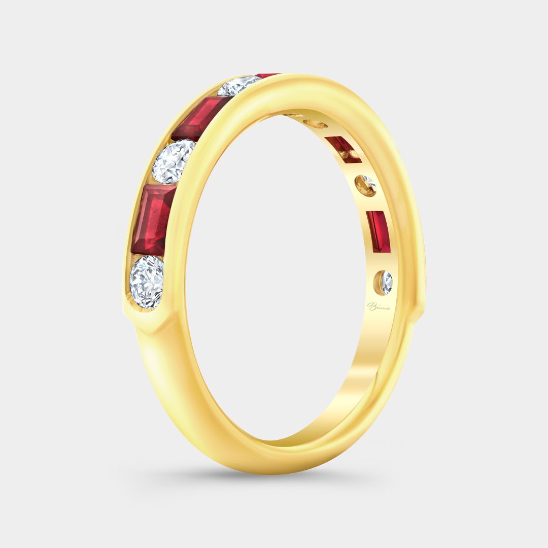 Channel set band with alternating round diamonds and baguette rubies in 18K yellow gold