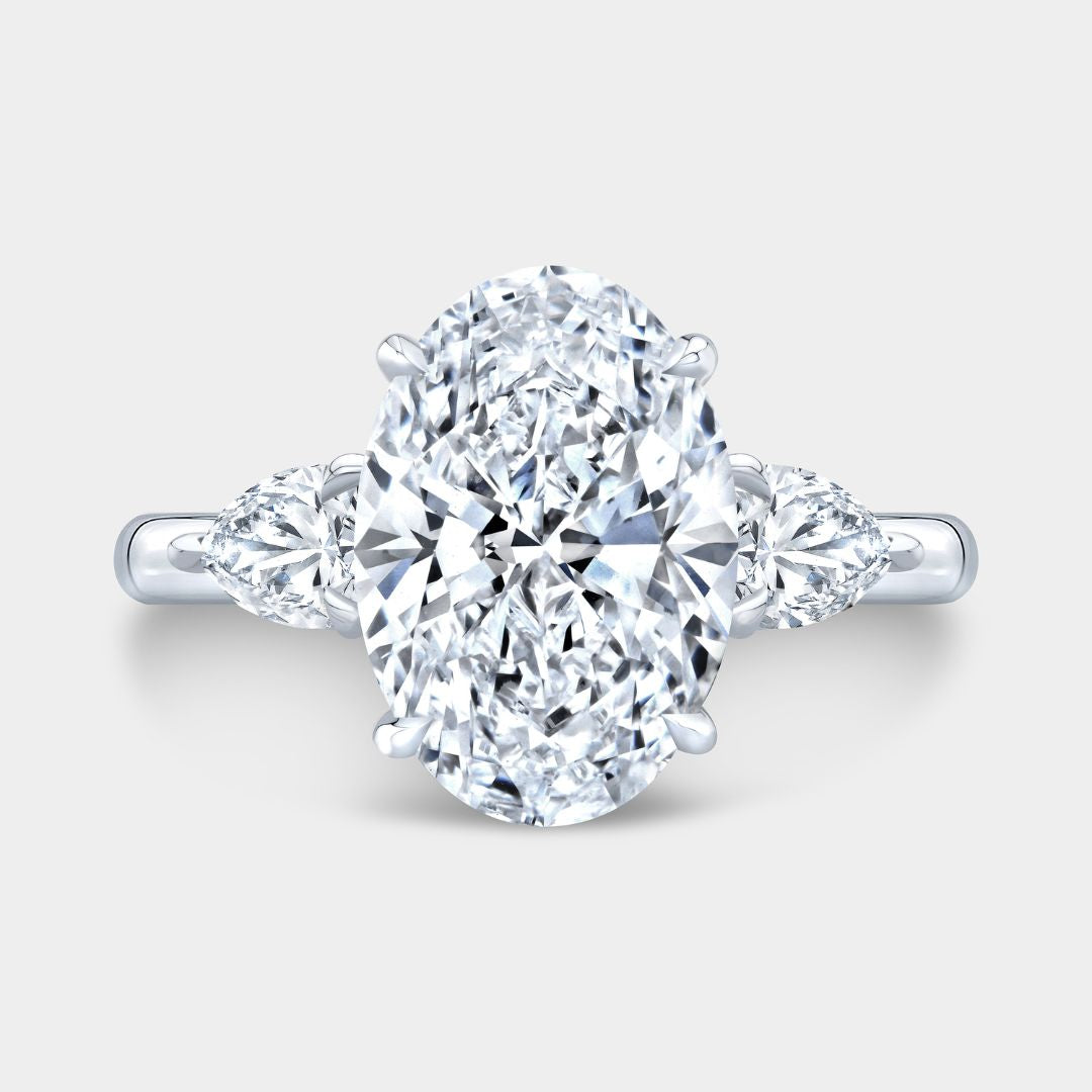 3.51ct Lab Grown Oval 3 Stone with Pear Shape Side Diamond Platinum Engagement Ring