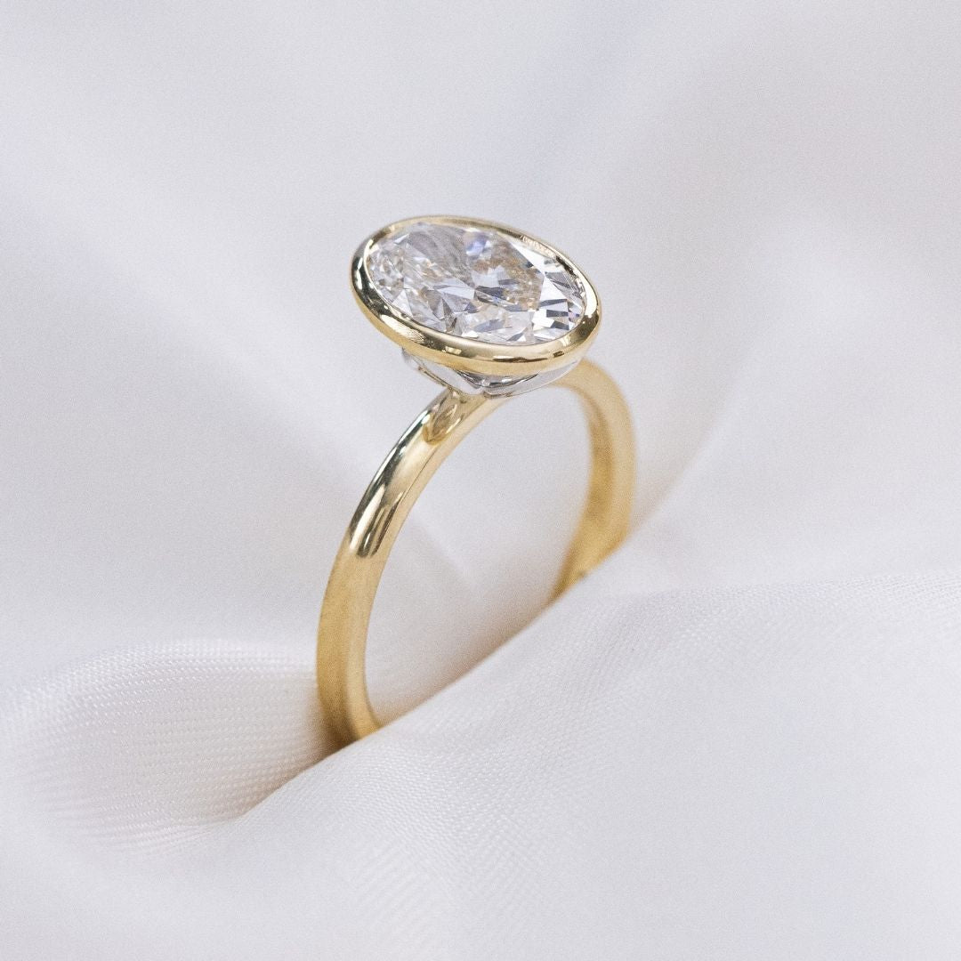 3.11ct Lab Grown Oval Diamond Bezel Set Tulip Solitaire Yellow and Platinum Gold Engagement Ring
