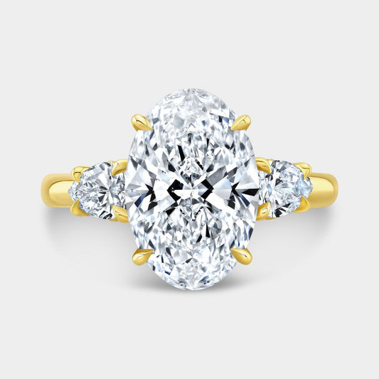 Oval Diamond with Pear Shape Diamond 3 Stone Yellow Gold Engagement Ring