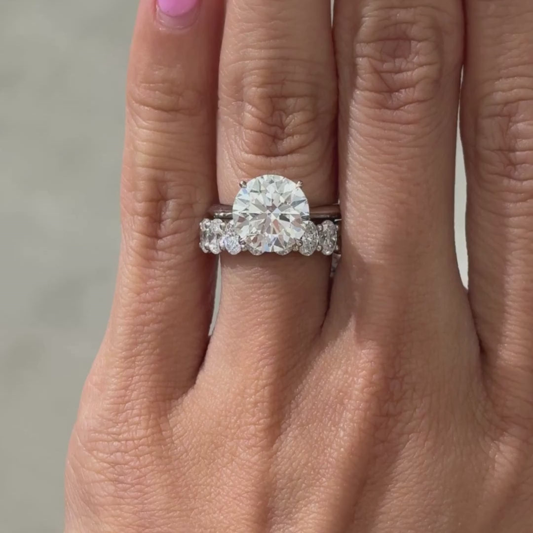 Video of 2ct oval diamond platinum double gallery anniversary half band 4.80mm
