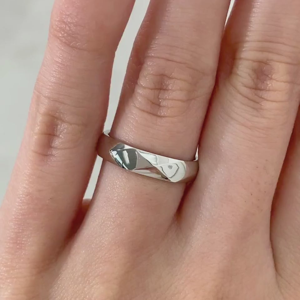 Video of men’s platinum wedding band with 4mm geometric faceted design