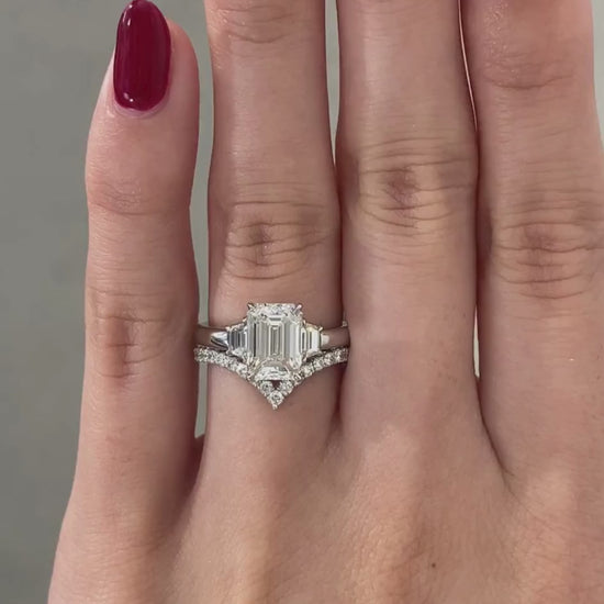 Video of 2.06ct lab grown emerald diamond 3 stone platinum engagement ring with trapezoid sides