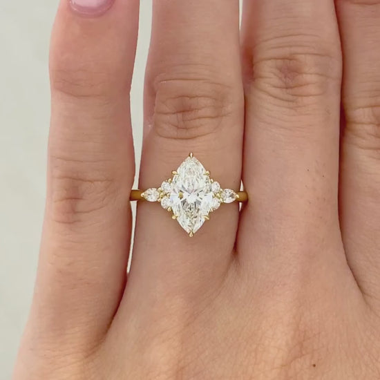 Video of marquise diamond 7 stone cluster Claudia engagement ring yellow gold
