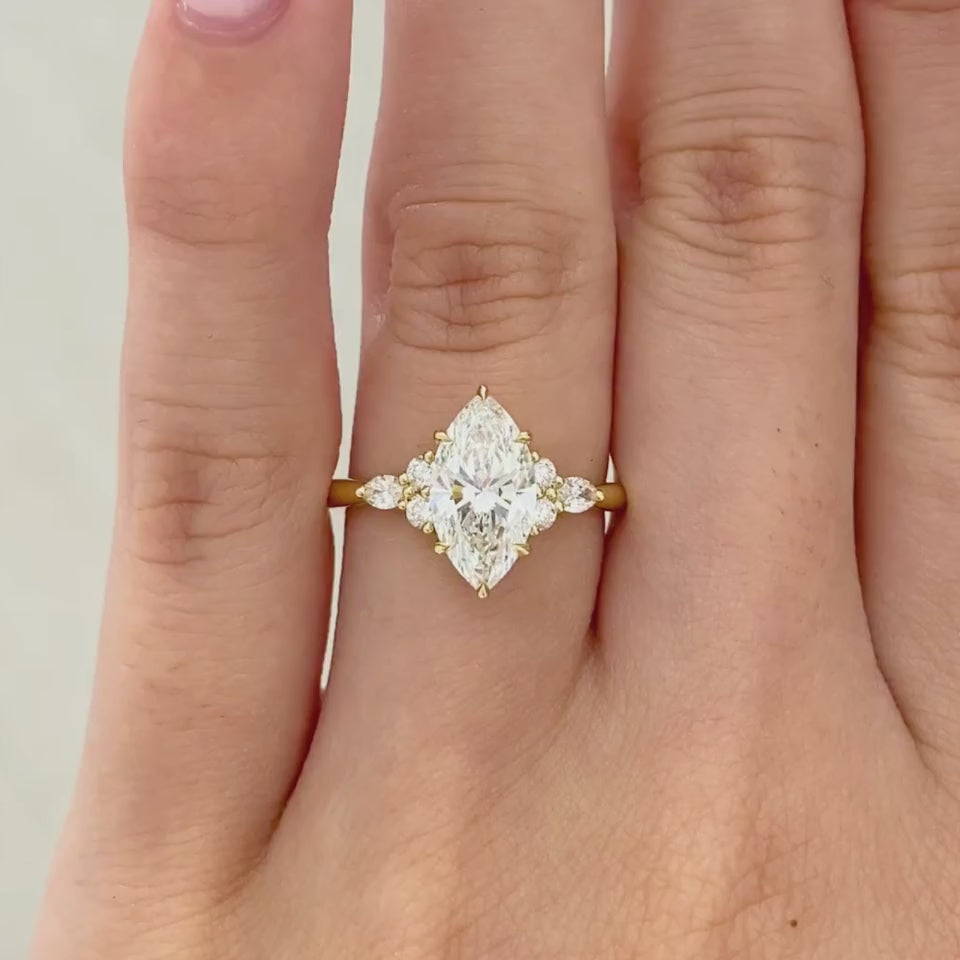 Video of marquise diamond 7 stone cluster Claudia engagement ring yellow gold