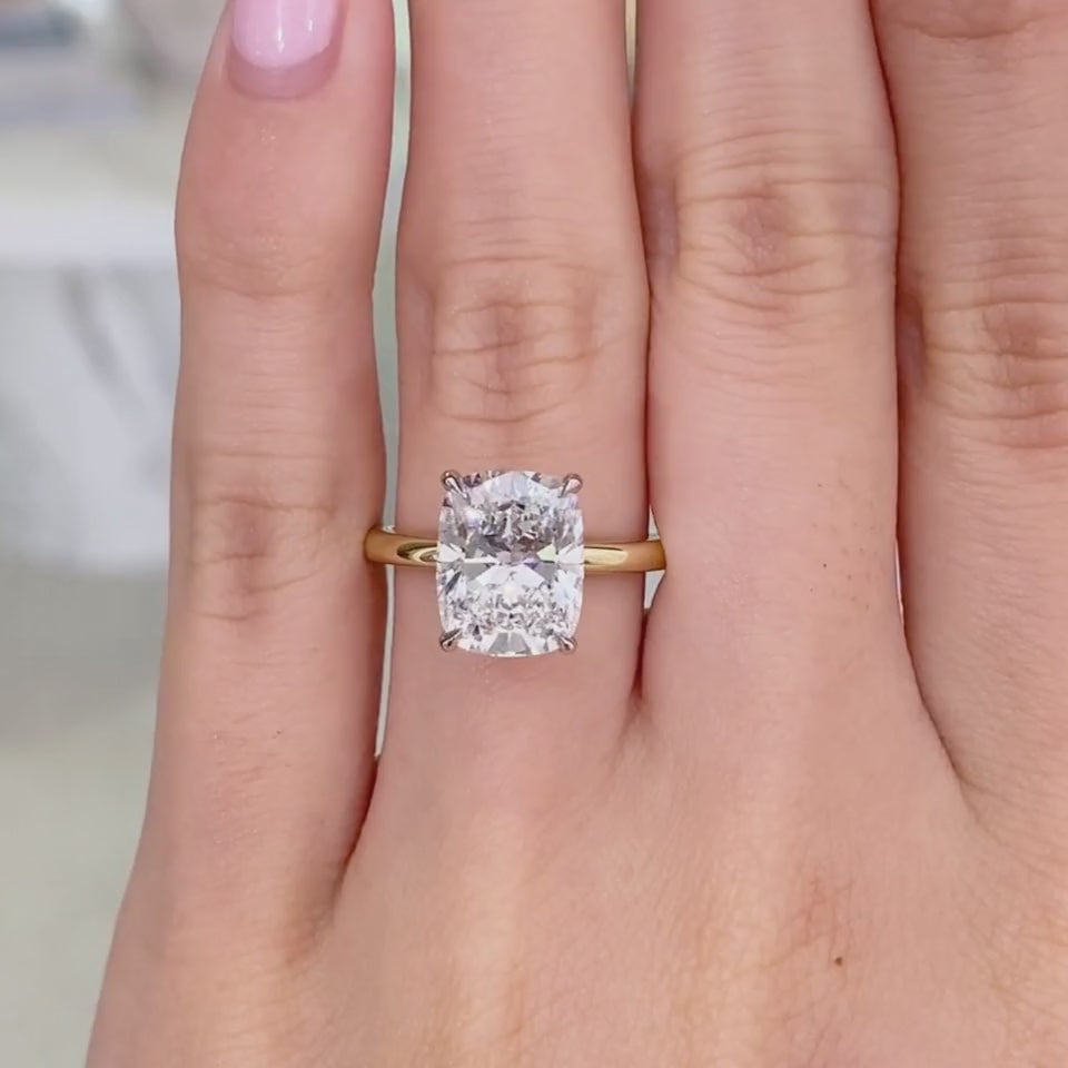 Video of cushion diamond solitaire ring with hidden halo in two-tone setting