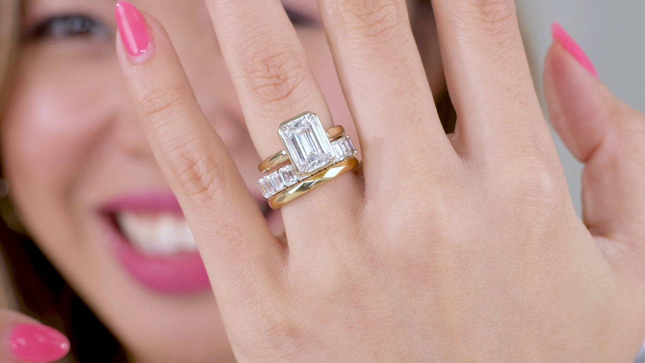 Emerald Cut Diamond Ring Paired With Faceted Geometric Band
