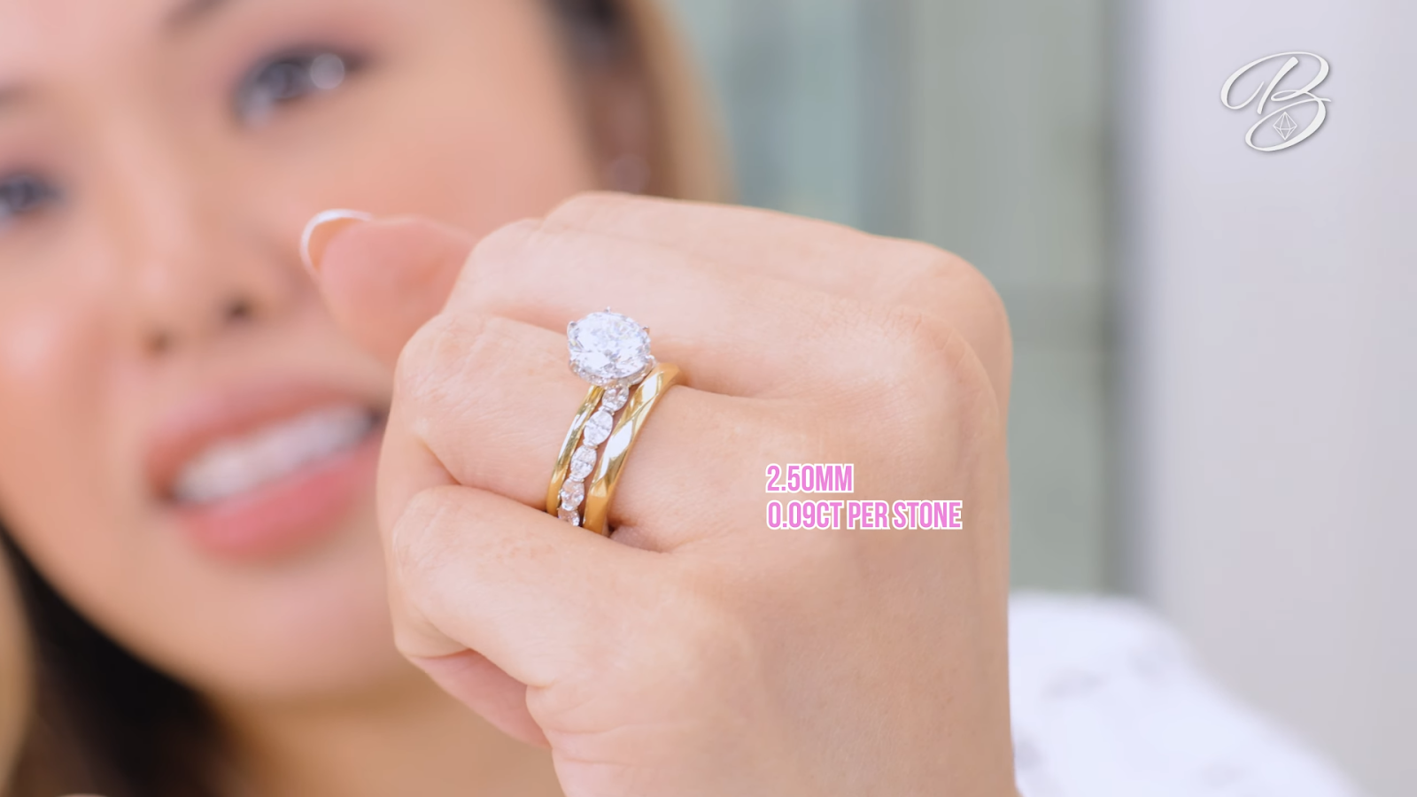 round solitaire engagement ring with a gold band