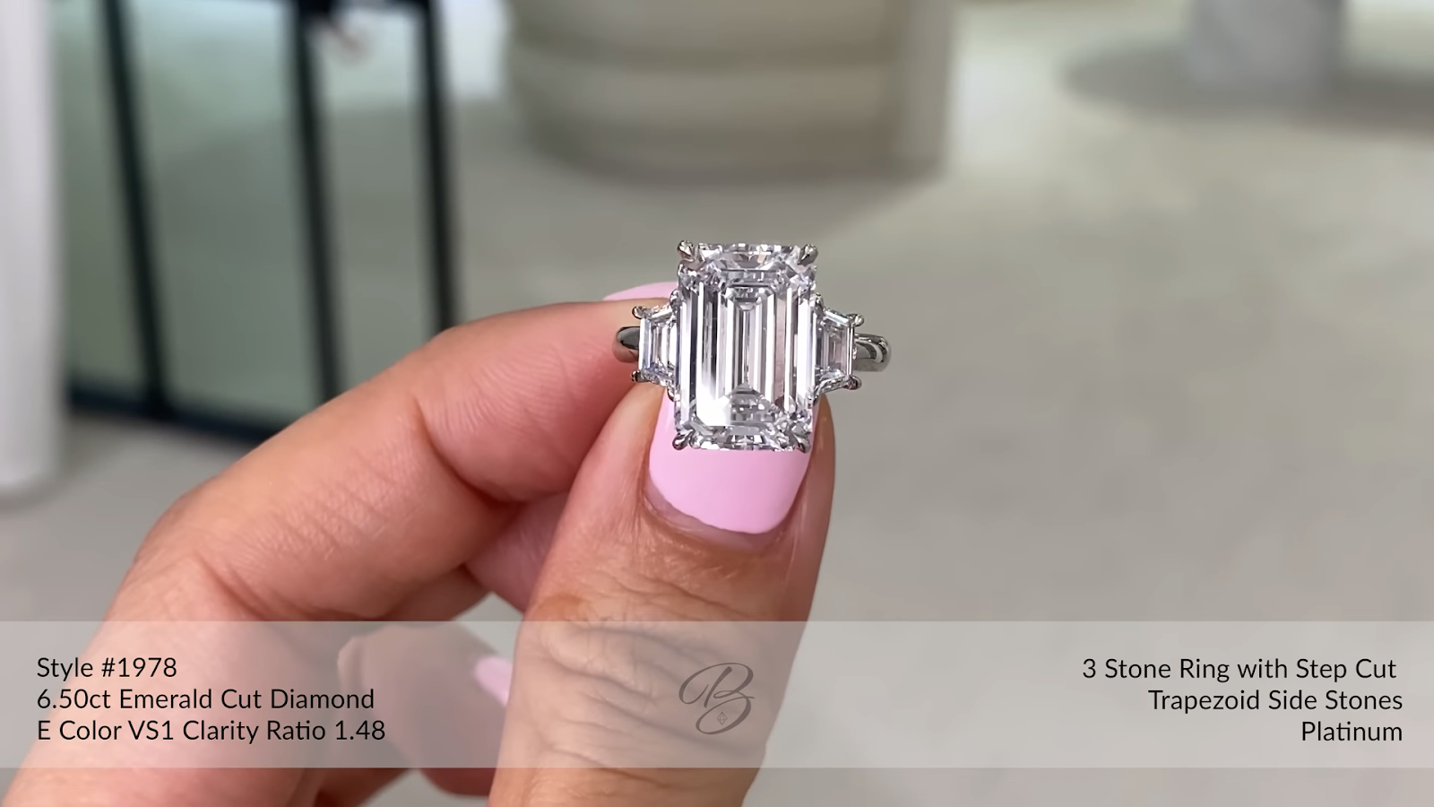 6.50ct Emerald Cut Diamond with Step Cut Trapezoid Side Stones